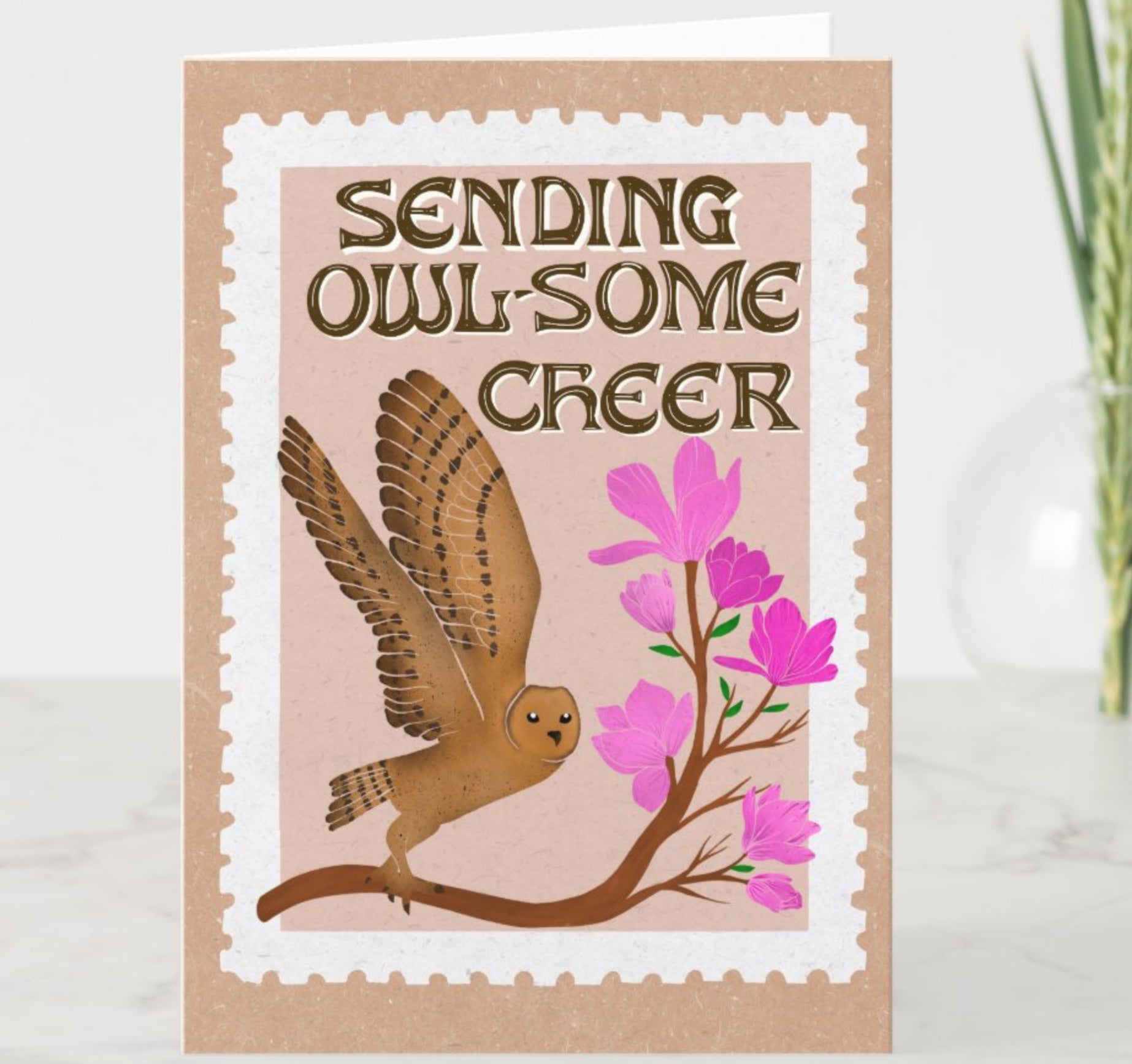Greeting card with owl and flowers and text 'Sending OWL-some cheer' on a white background